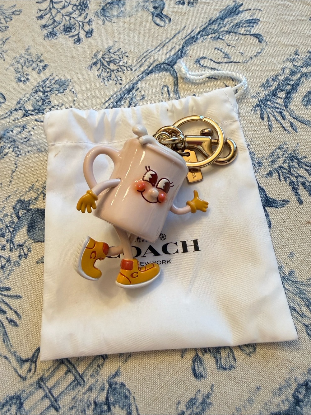Coach coffee charm